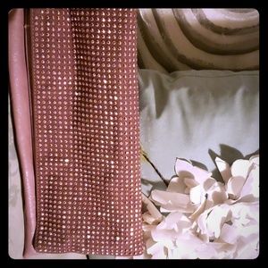 Folding beaded clutch